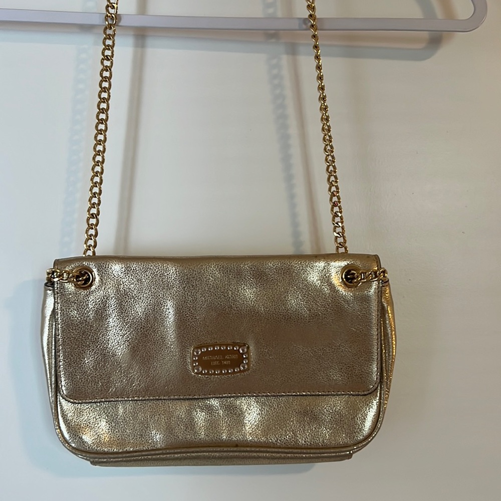 Small gold Michael kors purse used twice